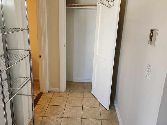 Closet off from kitchen, bathroom to the left