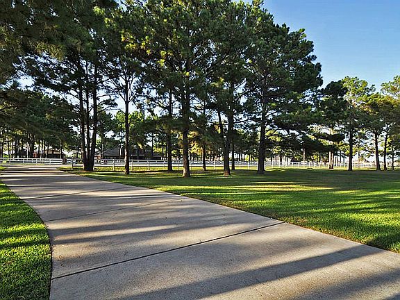 Long driveway leading to 2 car attached and 2 car detached garage!  Plenty of parking & room to store RV, boat, etc