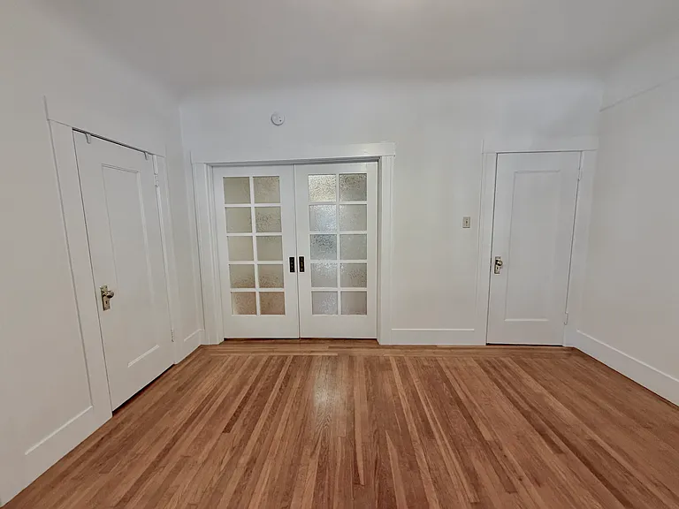 Bedroom with closed pocket doors