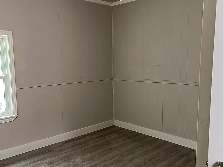 Second bedroom with tranquil view of the property