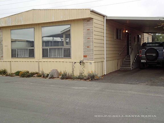 Deep Semi-Enclosed Carport