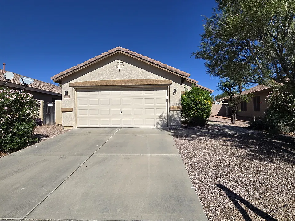 13228 W Port Au Prince Ln