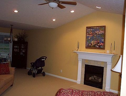Great room with vaulted ceiling, berber carpet, gas frpl