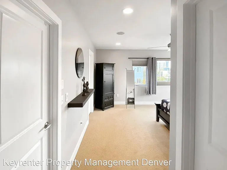 Master bedroom with two walk-in closets