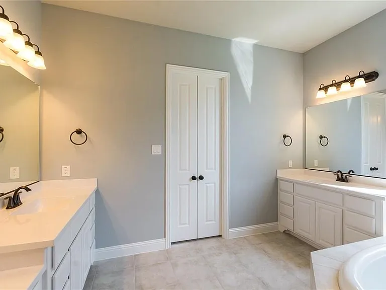 Primary Bathroom with double vanities