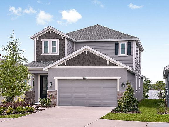 Jade model home exterior craftsman with opt stone William Ryan Homes