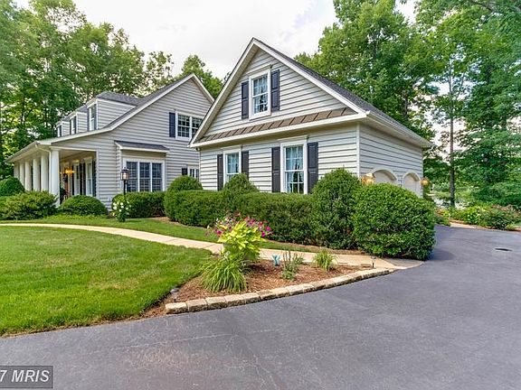 MAGNIFICENT CAPE COD LOCATED IN A CUL-DE-SAC