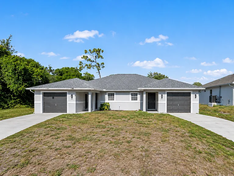Front view of property. Newer roof, fresh modern paint and great curb appeal