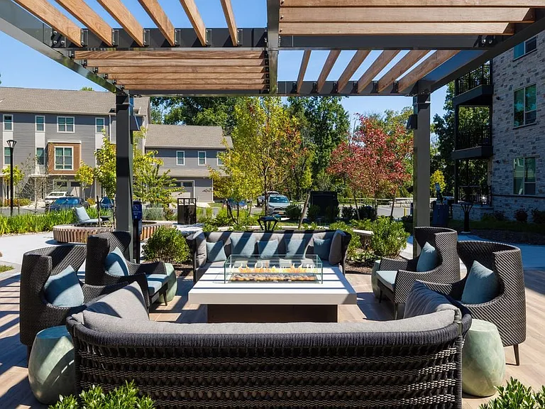 Courtyard with lounge seating and fireplace