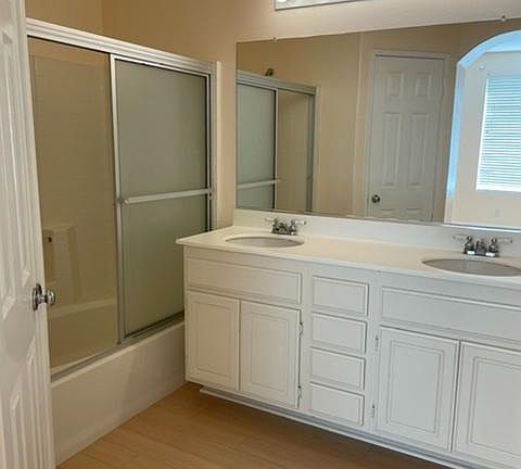 Master bathroom (enclosed toilet behind door on left)
