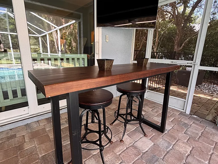 Smart TV by pool - watch sports and swim! Perfect summer retreat.