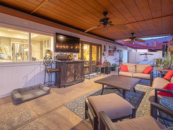 The backyard is an entertainer's dream. Outdoor covered area is 300 square feet.