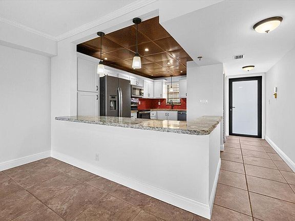 5th image of 2430 DEER CREEK COUNTRY CLUB Boulevard #506