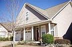 Montgomery Three BR Two BA, The front porch and rustic wood door