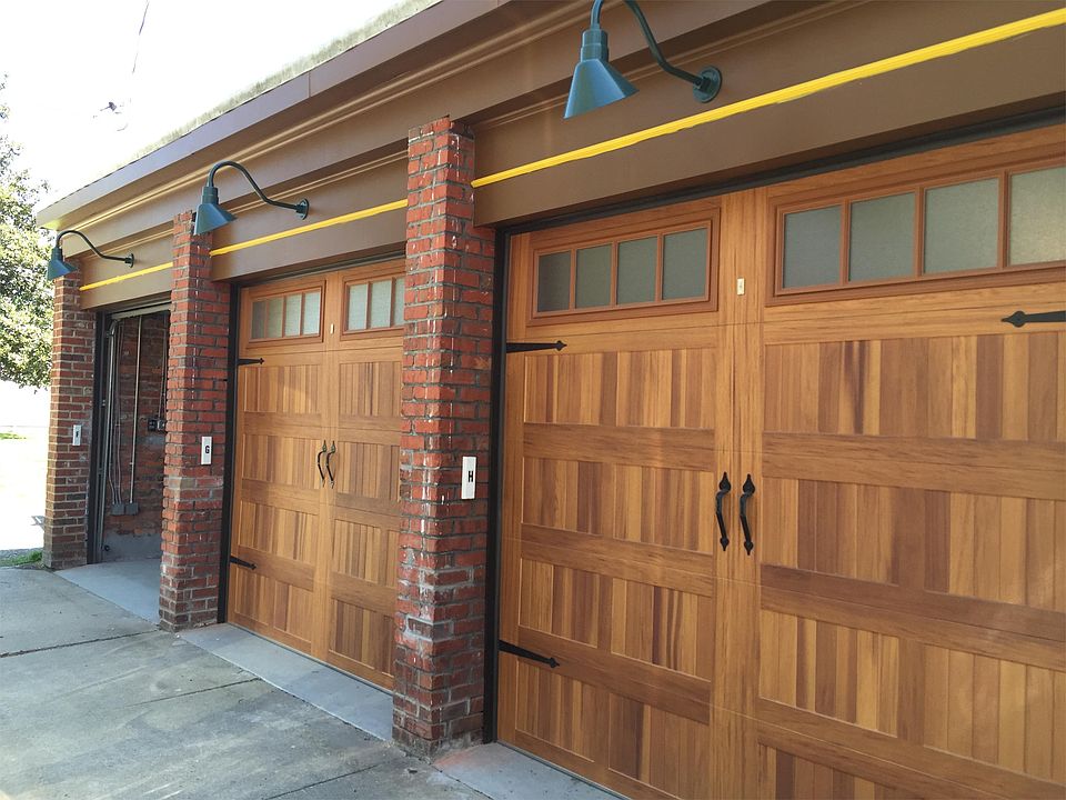 Garage comes with keypad access plus remote control. Outside light comes on when door is activated.