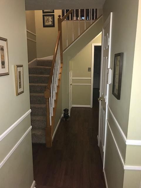 Foyer entrance- 1/2 bath to left and basement rev room strai