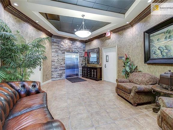 Secured main entrance and elevator to unit.