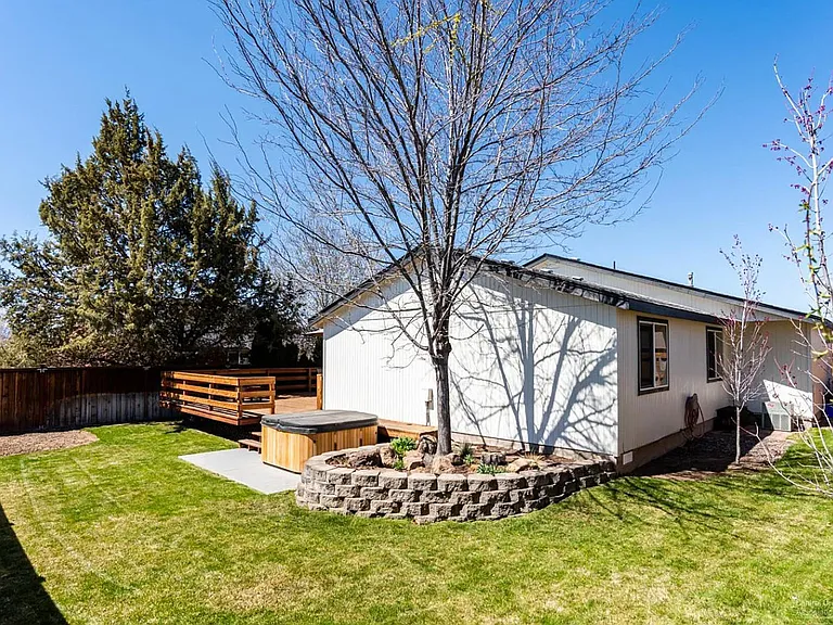 Backyard view (hot tub not included, but hookups and concrete pad are available)