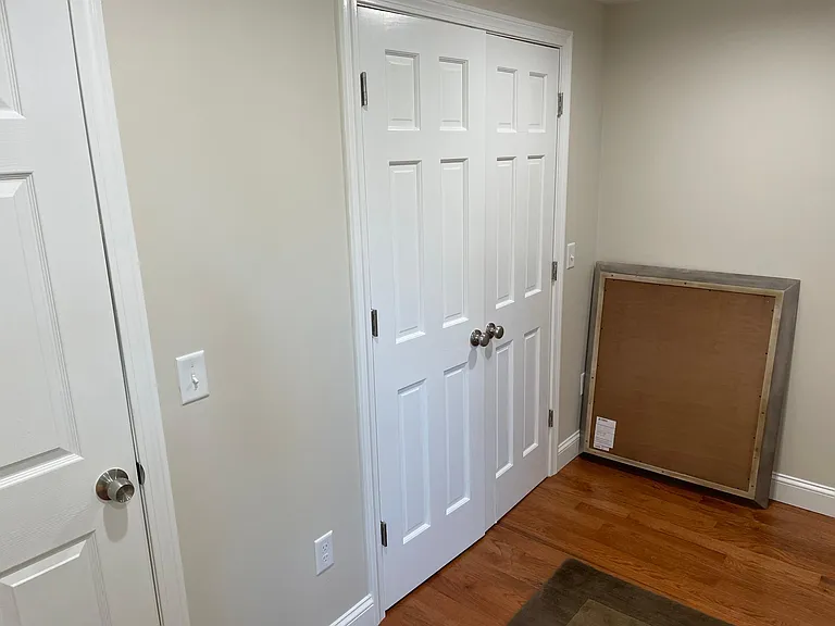 Upstairs hallway with wash/dryer closet