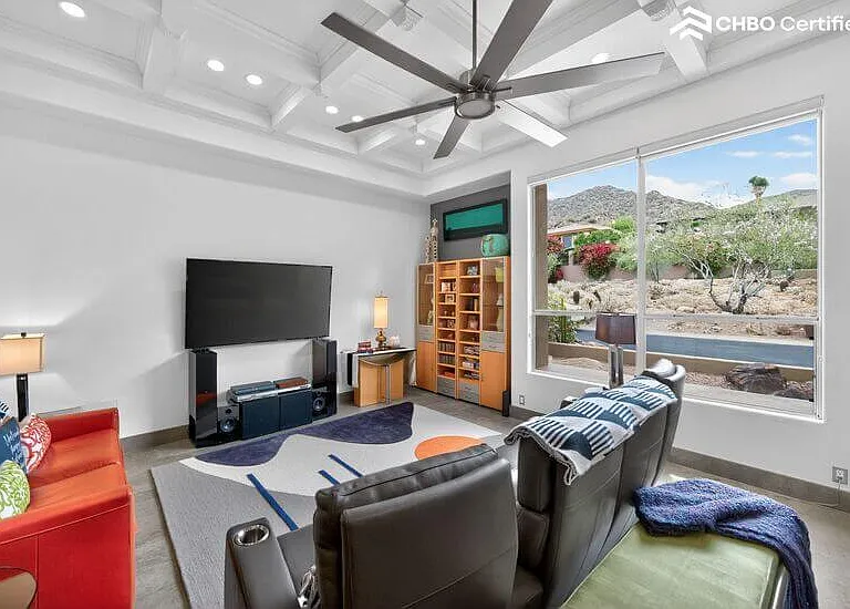Leather theater seating & sleeper sofa with 65" smart TV & v