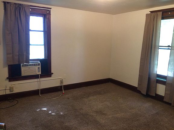 Living room/bedroom. All walls have been painted.