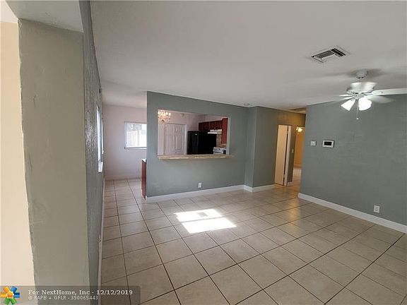 5th image of 611 NE 56th Ct