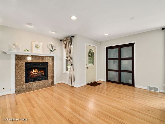Entry Foyer welcomes you while the adjacent Sitting/Nook area off the Great Room sets the inviting t