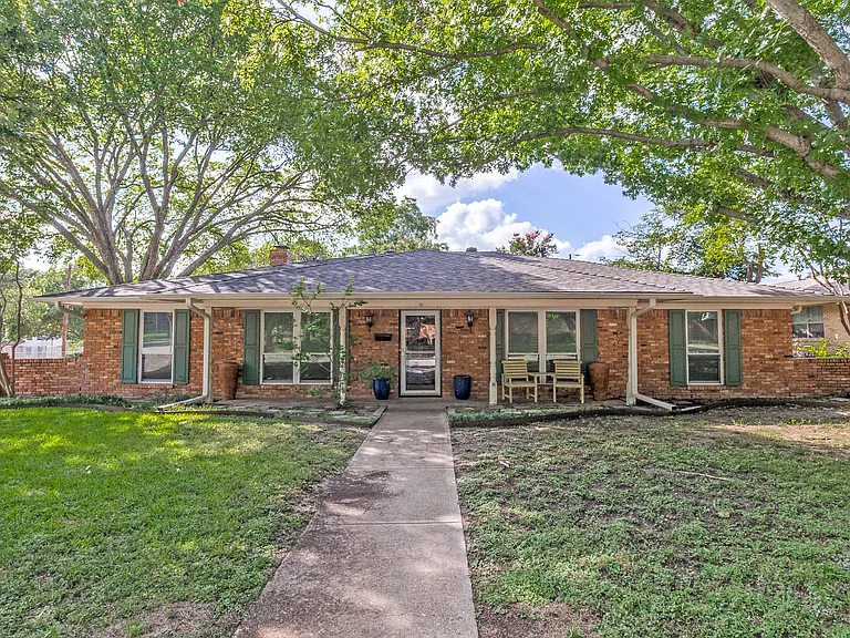 Welcome to this charming 4 bedroom home located on a tranquil street that's adorned with mature trees on an almost .25 acre corner lot.
