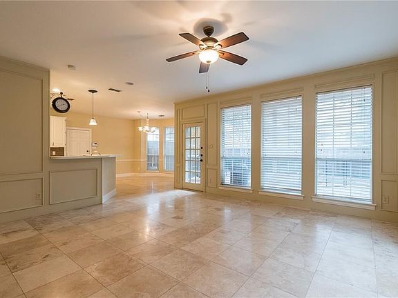 Artificial turf was professionally installed on the side yard just off the pool area.