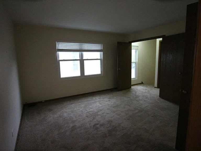 Master bedroom with double doors.