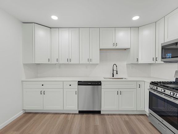 2nd image of 606 E 164th Ter APT B