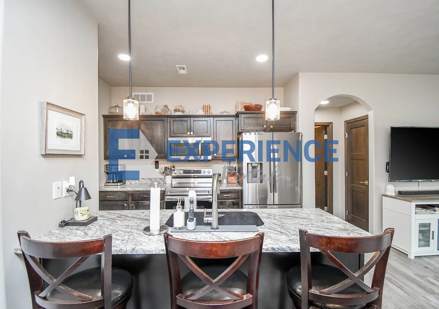 Spacious 3-Bedroom Townhome with Rare 3-Stall Garage! — Photo 4