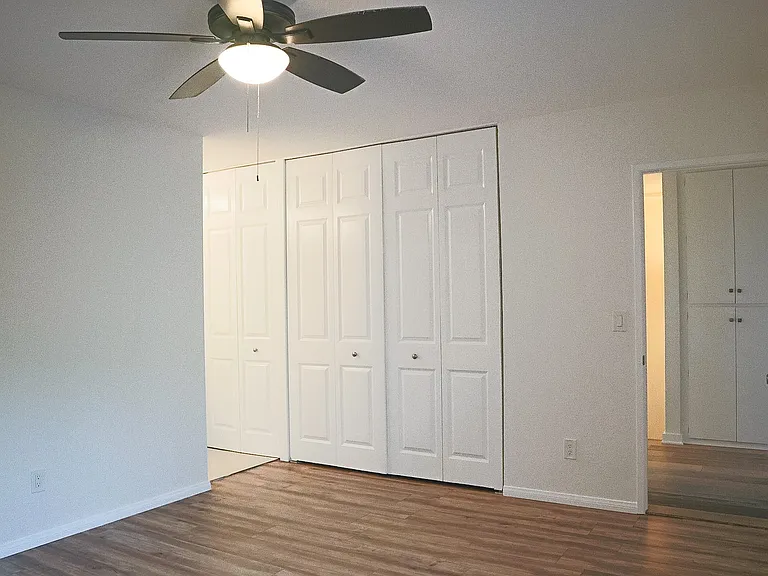 Primary Bedroom with en suite bathroom and balcony.