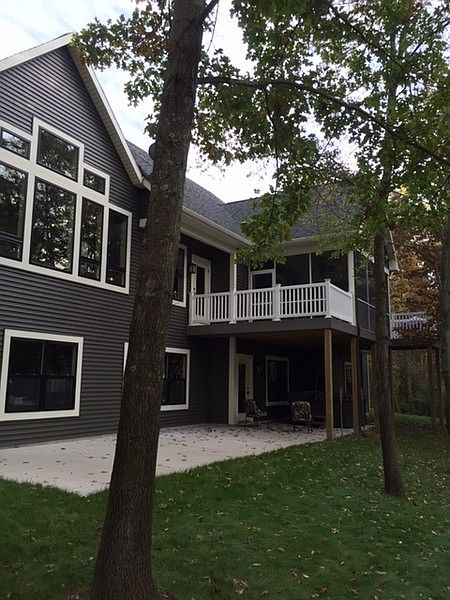Walk-out, Protected, wired hot tub area
						:
						Daily enjoyment of nature's beauty with wall of windows both levels! .8 acres!