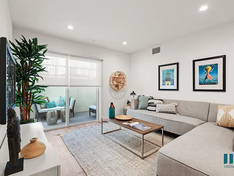 Living Room with Vinyl Flooring, Recessed Lighting, and Patio