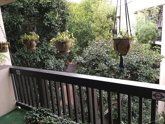 Balcony with tree views - top floor unit