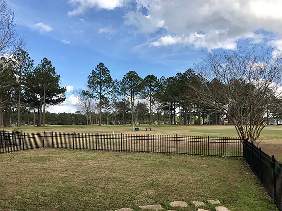 View of practice putting green and 10th tee