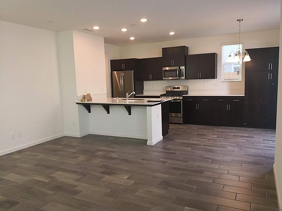 nice kitche, with stainless appliances , open kitchen with living room