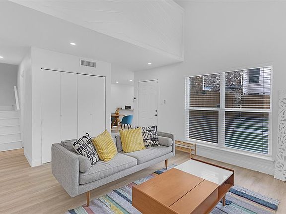 ANOTHER VIEW OF THE LIVING ROOM