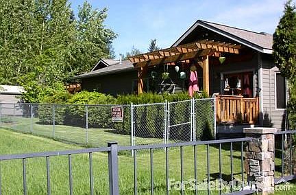 BACK OF HOME
						:
						fenced back yard, deck, pergola, hot tub with pergola