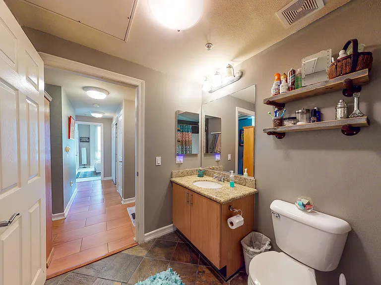 2nd bathroom - view from bathtub down the hall