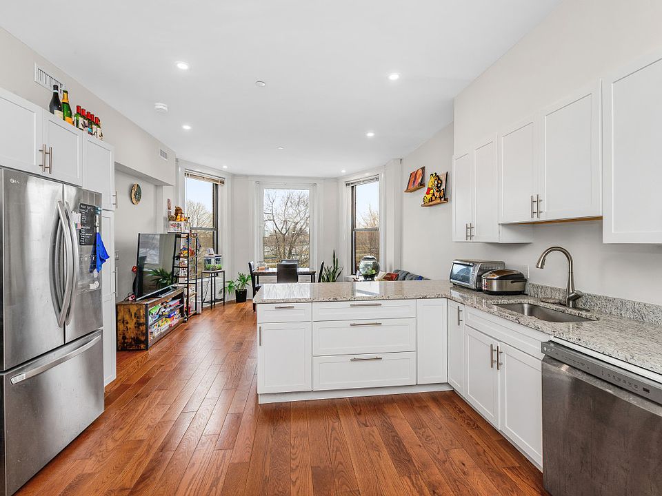 Modern Kitchen open to living room.