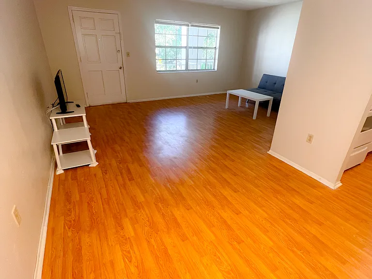 Unit is unfurnished and photos are staged. Furniture not included.