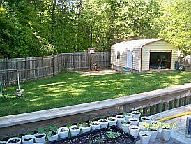 View of back deck to garage