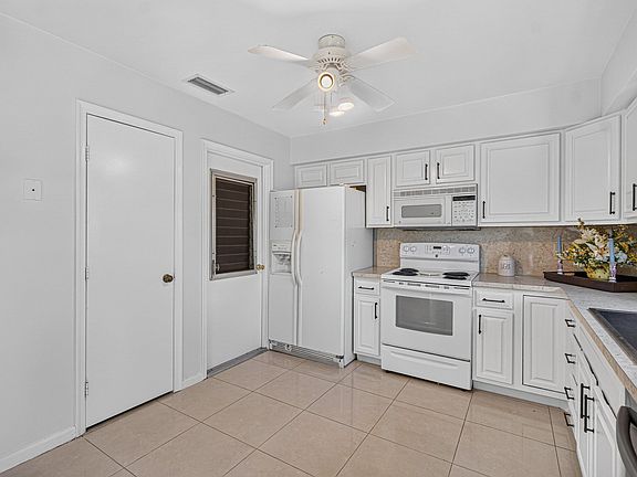 2nd image of 9830 Bischofia Tree Way