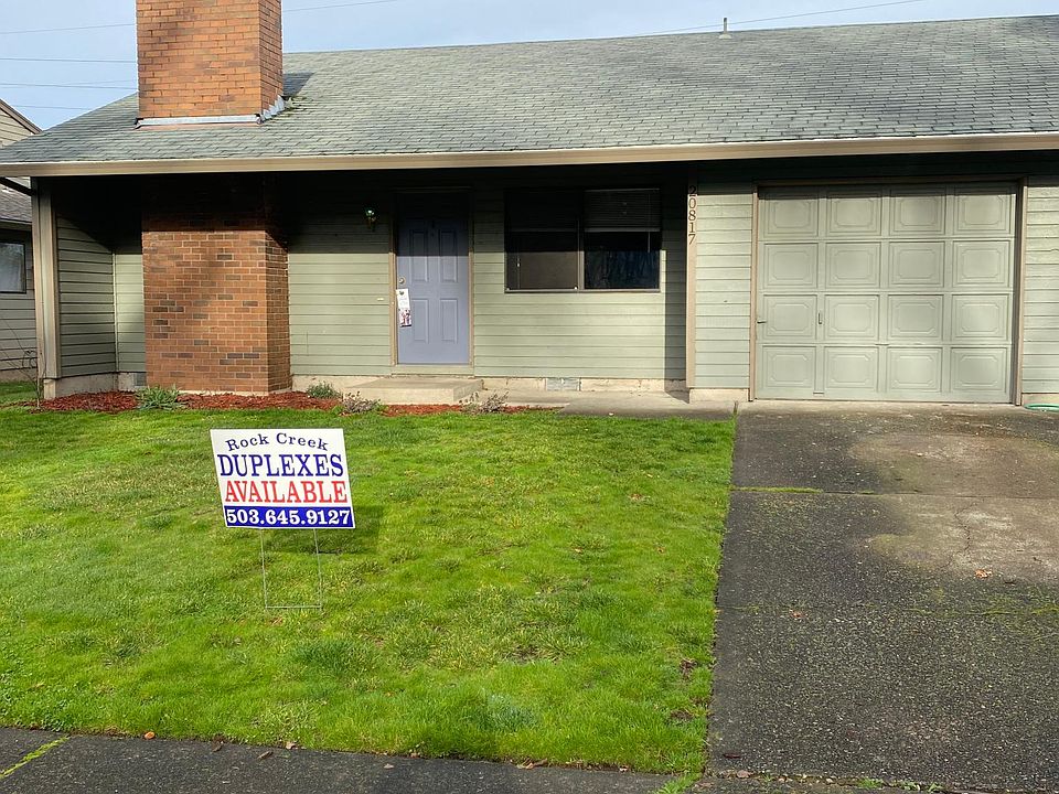 Front of unit with private driveway