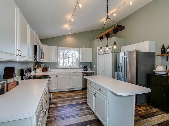 Updated Kitchen with new flooring, lighting and new high-end appliances