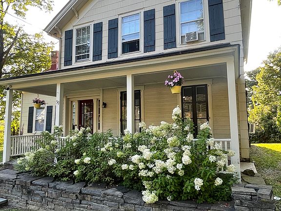 Front view with covered porch