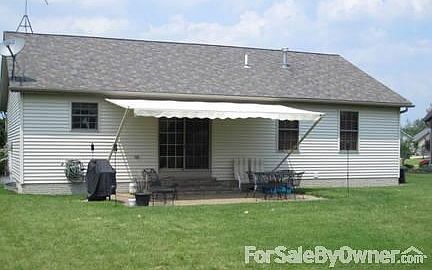 Back of House
						:
						Sunsetter awning provides shade to the paverstone 15X25 ft patio. 80 sq ft shed.
