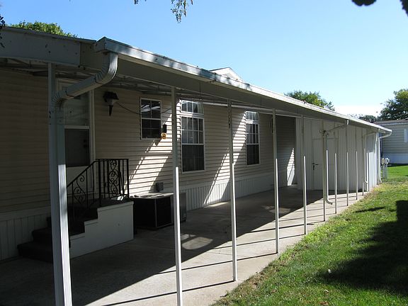 Carport with Attached Shed